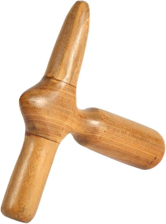 Strumento in legno per massaggio.