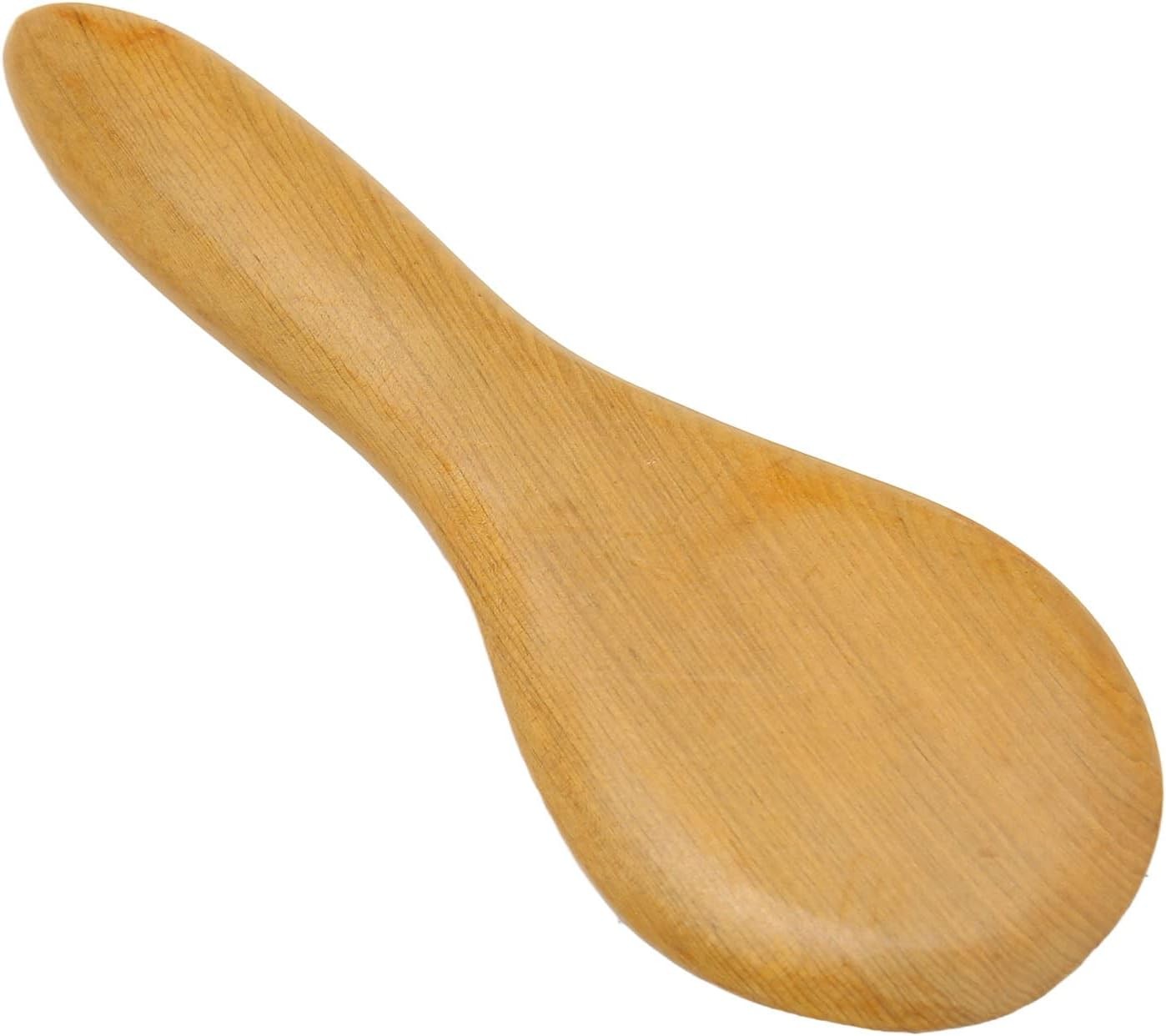 Strumento in legno per massaggio.